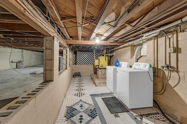 basement featuring washer and dryer