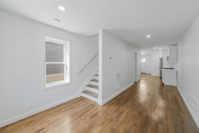 interior space with hardwood / wood-style floors