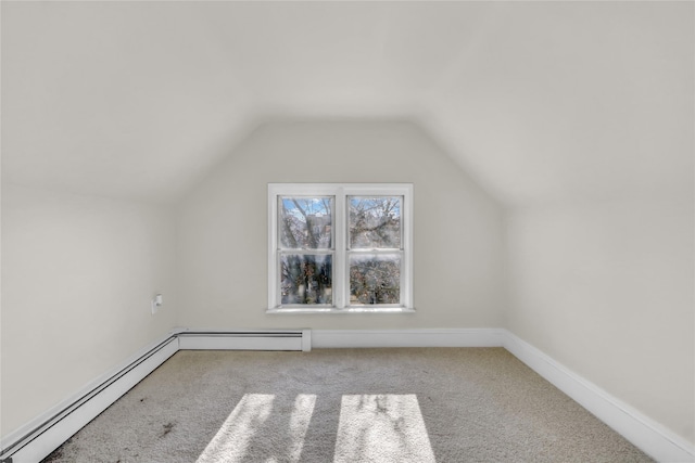 bonus room featuring carpet, a baseboard radiator, and vaulted ceiling