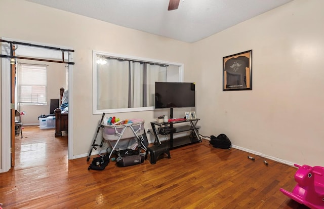 interior space featuring hardwood / wood-style flooring and ceiling fan