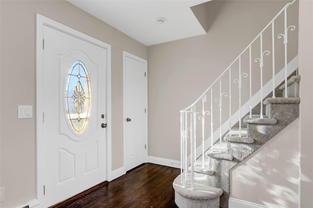 entrance foyer featuring dark hardwood / wood-style floors