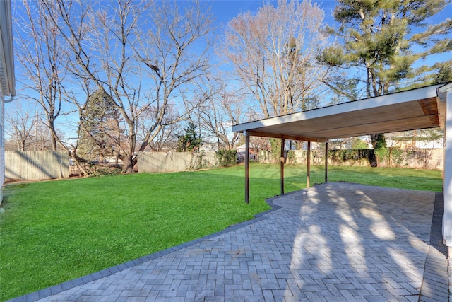 view of yard featuring a carport