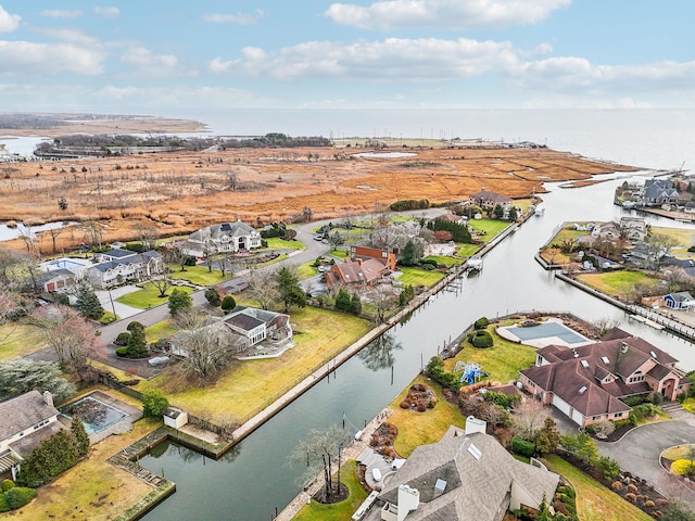 bird's eye view with a water view