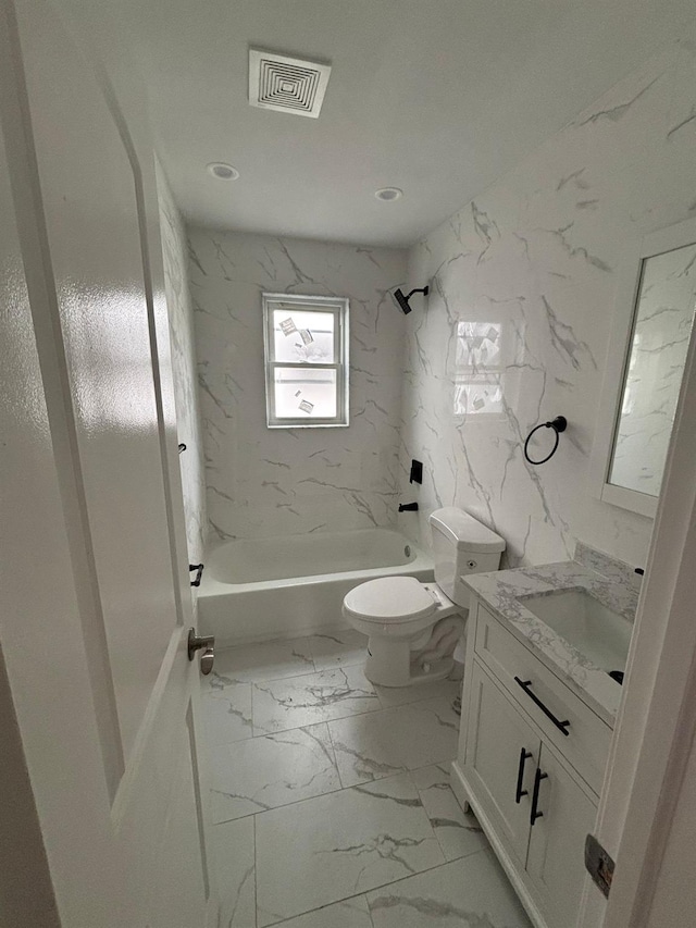 full bathroom with shower / tub combination, vanity, and toilet