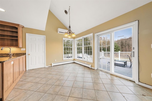 unfurnished dining area with sink, high vaulted ceiling, a notable chandelier, a wall unit AC, and light tile patterned flooring