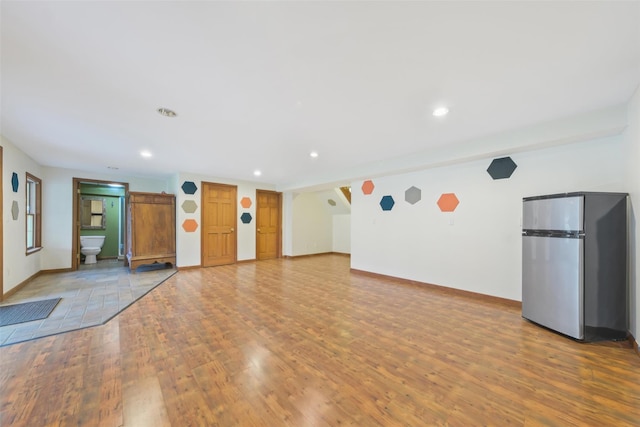 exercise area featuring wood-type flooring