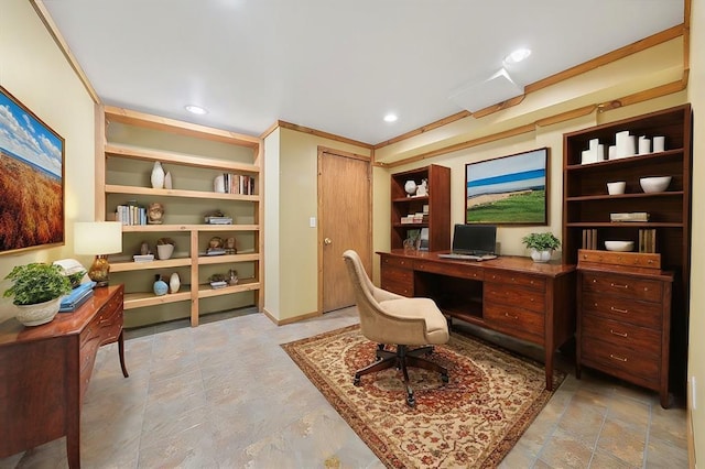 office area with built in shelves and crown molding