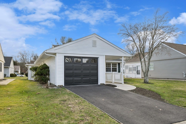 single story home featuring a garage and a front yard