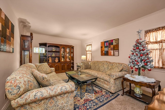 living room featuring carpet floors and ornamental molding