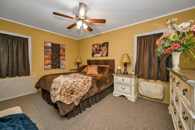 carpeted bedroom featuring ceiling fan, radiator heating unit, and crown molding