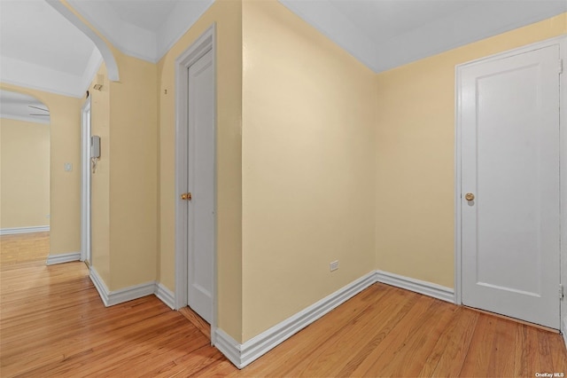 corridor with light hardwood / wood-style flooring