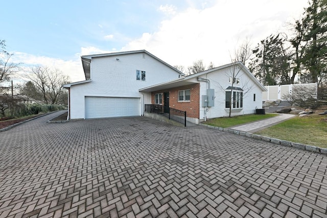 view of home's exterior with a garage