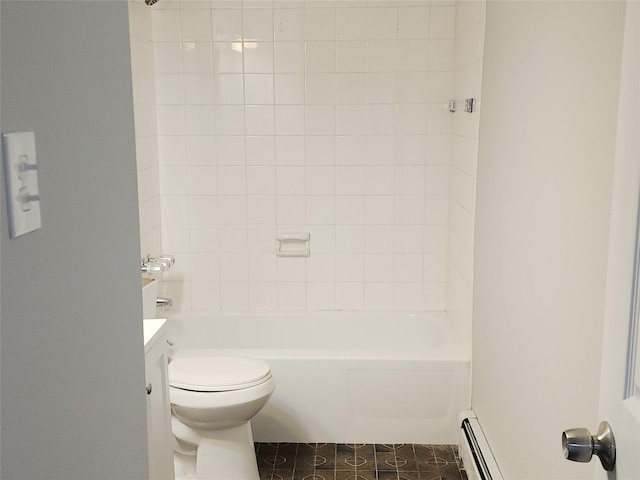 full bathroom with vanity, a baseboard heating unit, tiled shower / bath, tile patterned flooring, and toilet