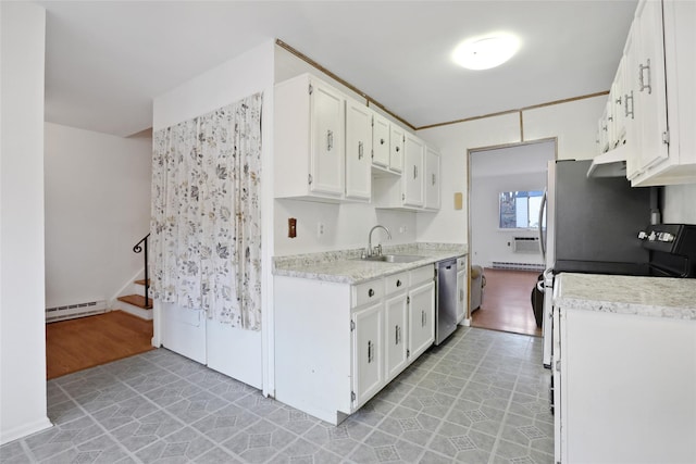 kitchen featuring stainless steel dishwasher, a baseboard heating unit, sink, white cabinets, and light tile patterned flooring