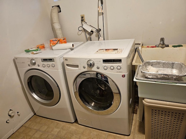 laundry room featuring independent washer and dryer