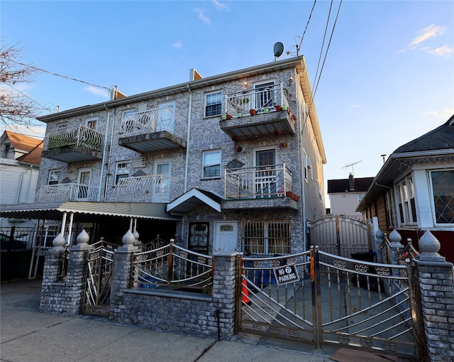 view of property with a balcony