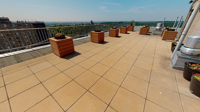 view of patio / terrace with a balcony