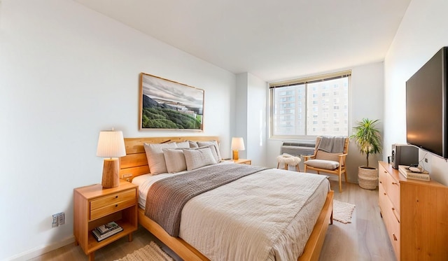 bedroom featuring light hardwood / wood-style flooring