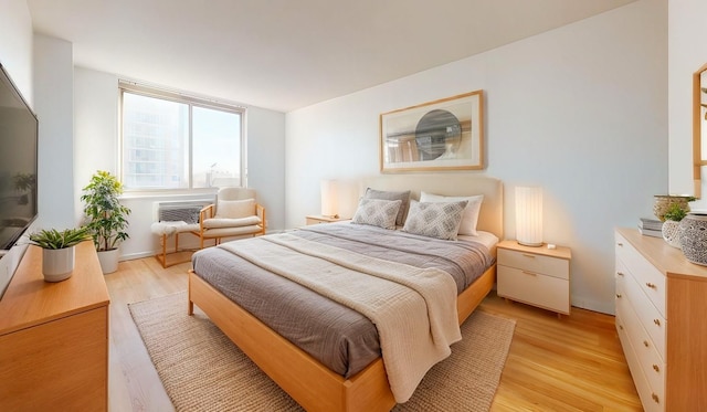 bedroom featuring light wood-type flooring