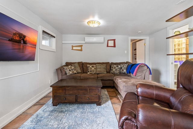 living room featuring light tile patterned floors and a wall unit AC