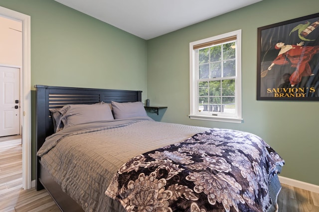 bedroom featuring hardwood / wood-style flooring