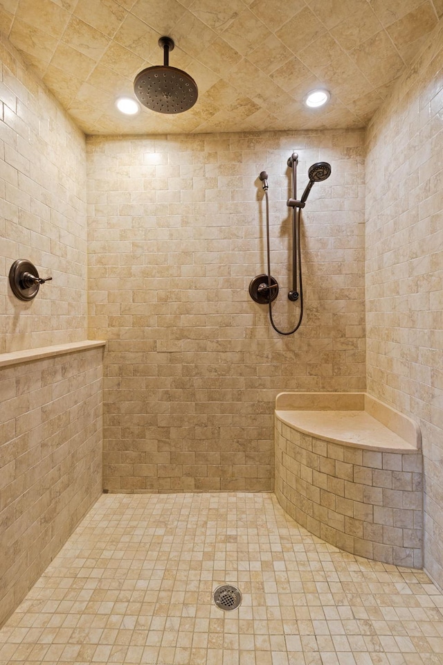 bathroom featuring tiled shower