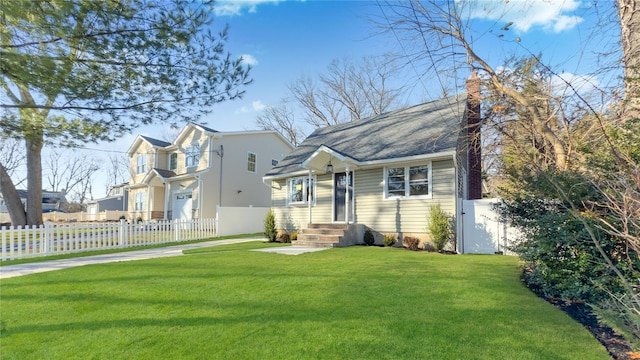 view of front facade featuring a garage and a front yard