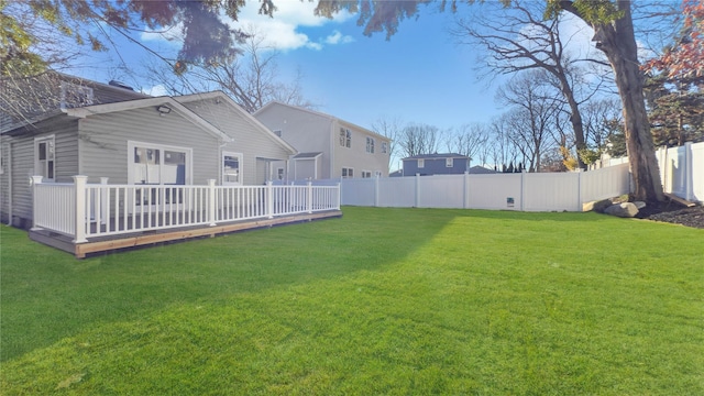 view of yard featuring a wooden deck