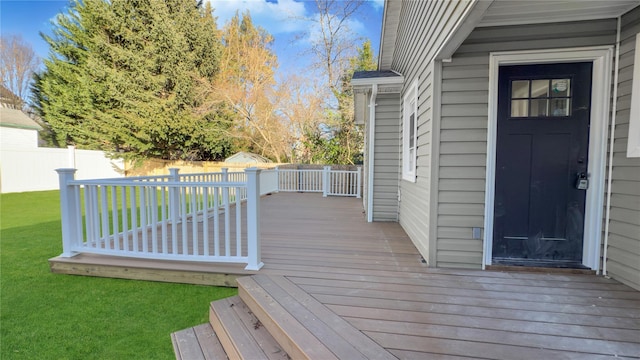 deck featuring a yard