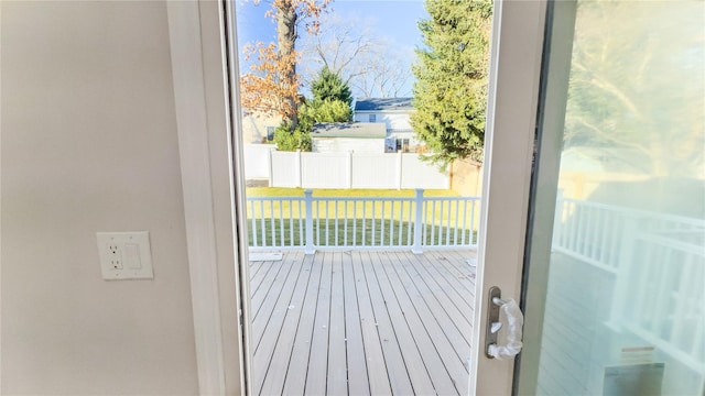 doorway to outside featuring a healthy amount of sunlight