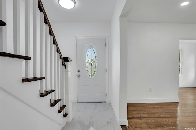 foyer with plenty of natural light