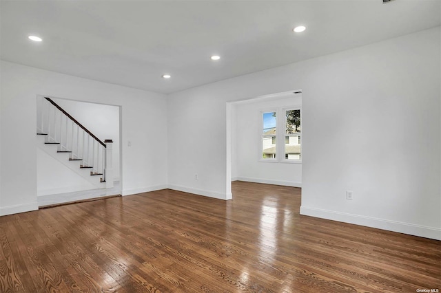 spare room featuring hardwood / wood-style floors