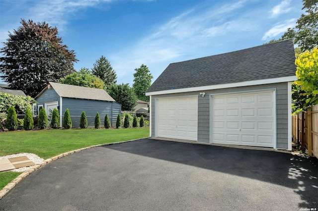 garage with a yard