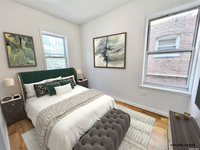 bedroom featuring light hardwood / wood-style flooring