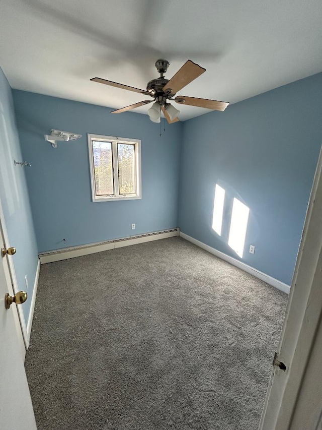 unfurnished room featuring ceiling fan, carpet, and a baseboard radiator