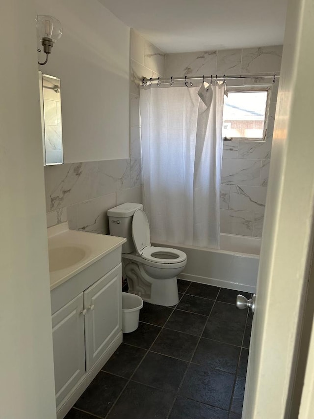 full bathroom featuring toilet, shower / tub combo, tile walls, and vanity