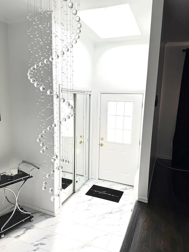 entrance foyer with crown molding