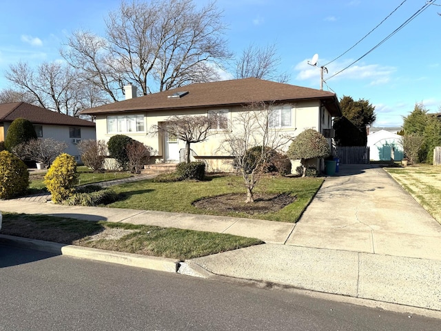 view of front of home with a front yard