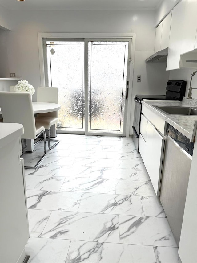 kitchen with range with electric cooktop, stainless steel dishwasher, and white cabinets