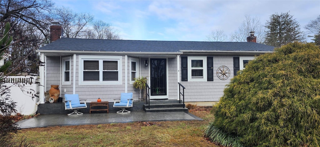 view of front of home featuring a patio area