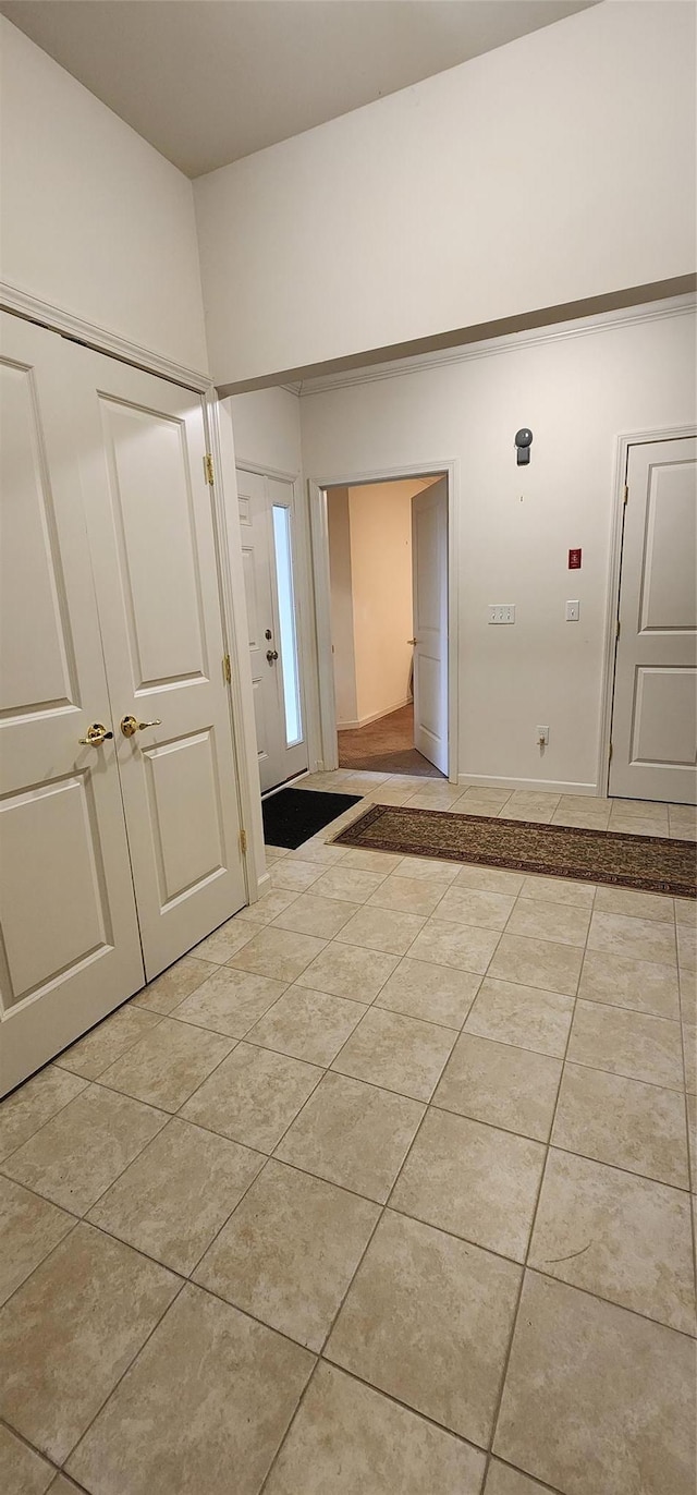 interior space featuring light tile patterned floors