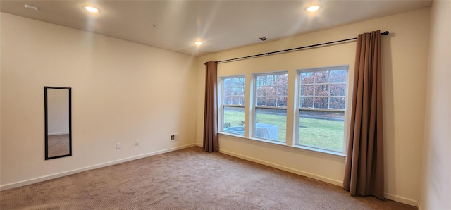 view of carpeted spare room