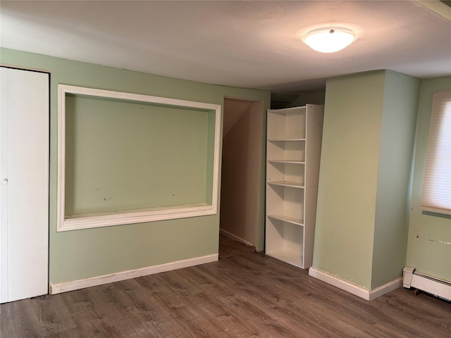 closet featuring baseboard heating