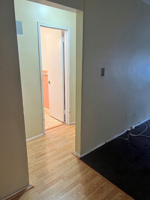 hallway featuring light wood-type flooring