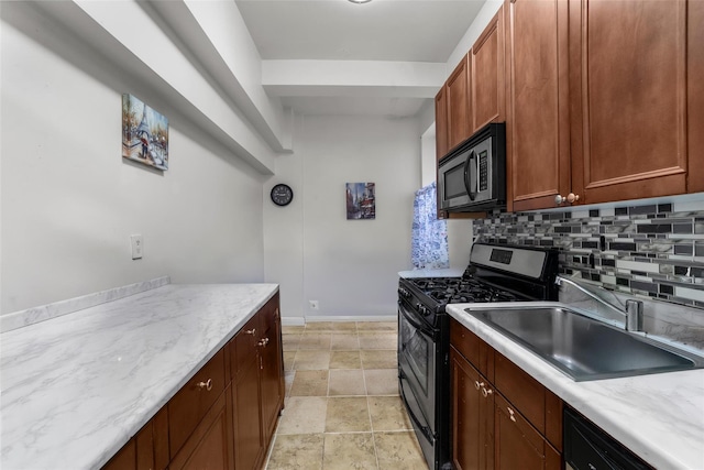 kitchen with dishwasher, tasteful backsplash, sink, and stainless steel gas range