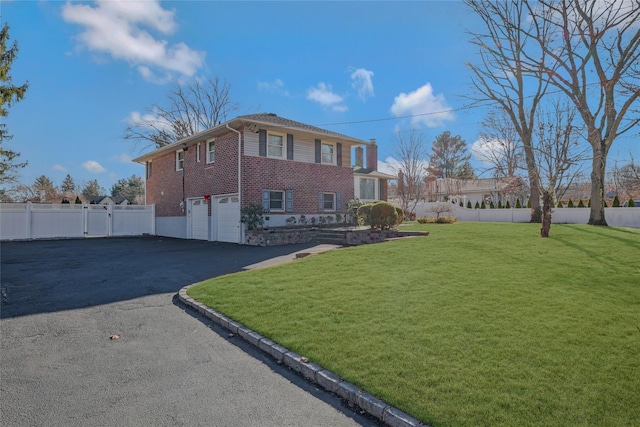 exterior space featuring a yard and a garage