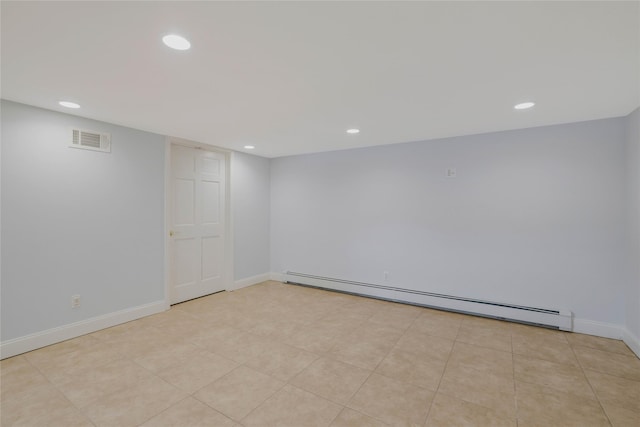 empty room with a baseboard heating unit