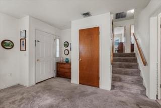 entryway featuring carpet