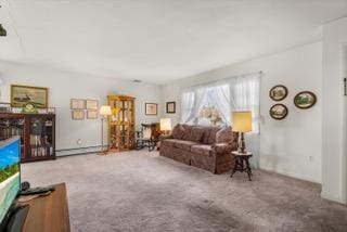 carpeted living room featuring baseboard heating