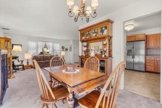 dining room featuring a chandelier